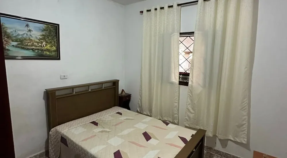 casa-terrea-aruja-quarto-com-cama.jpg