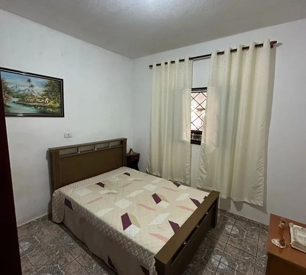 casa-terrea-aruja-quarto-com-cama.jpg
